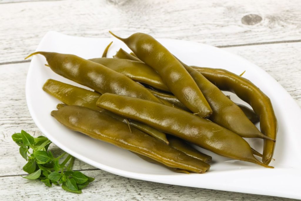 Pickled green beans on plate