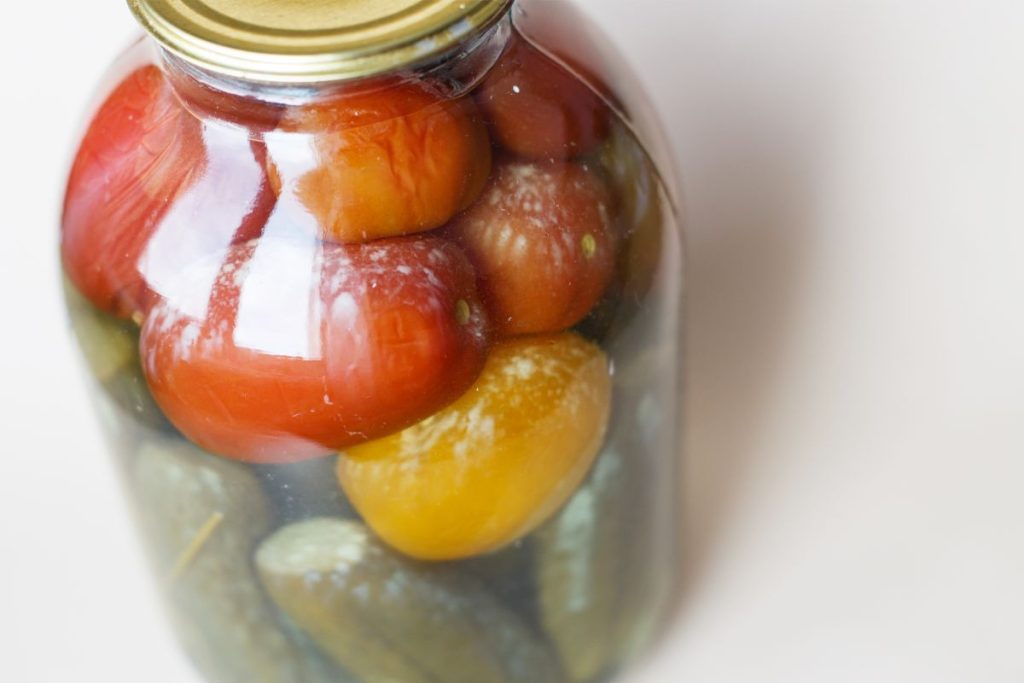 Up close photo showing bacteria in pickle jar