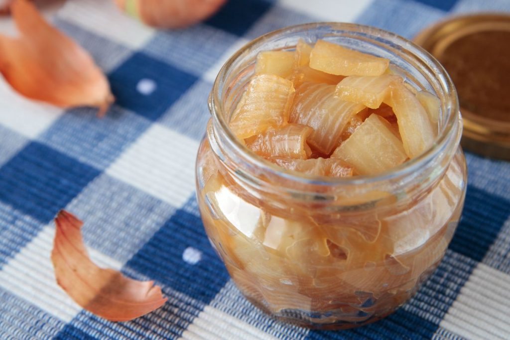 Caramelized onion pieces in jar