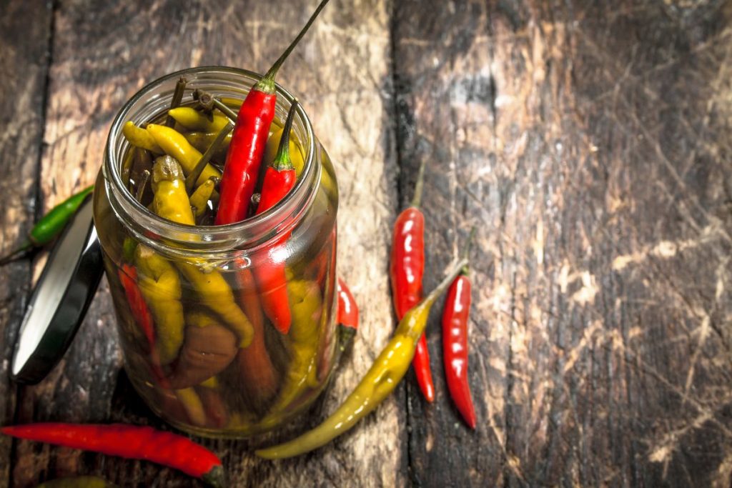 Pickled red and yellow hot peppers