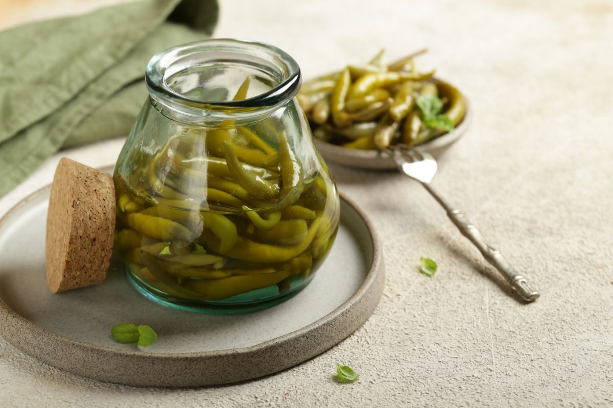 pickled serrano peppers in a jar