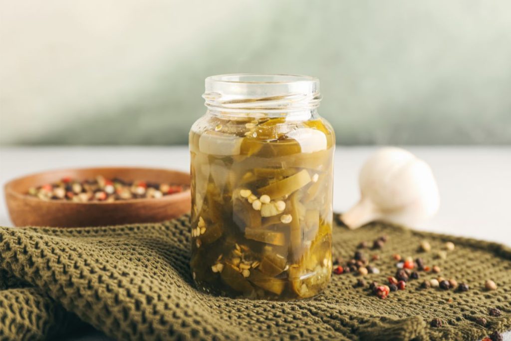Jar of opened canned jalapenos