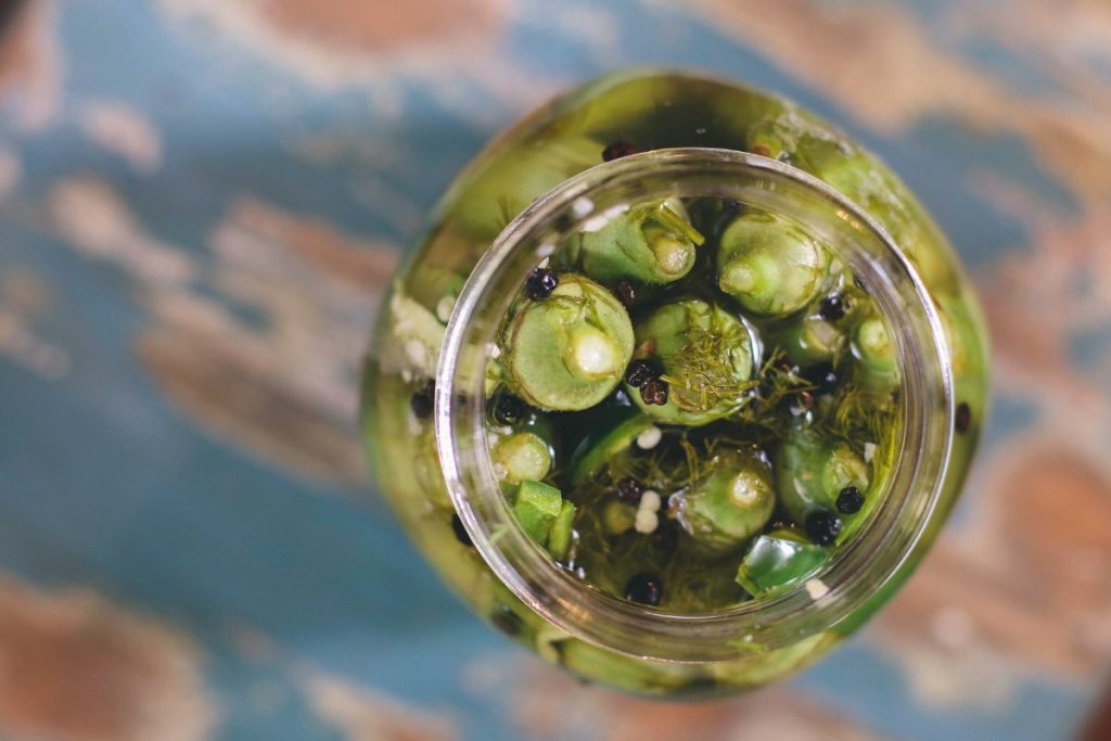 Pickled okra with peppercorns and dill