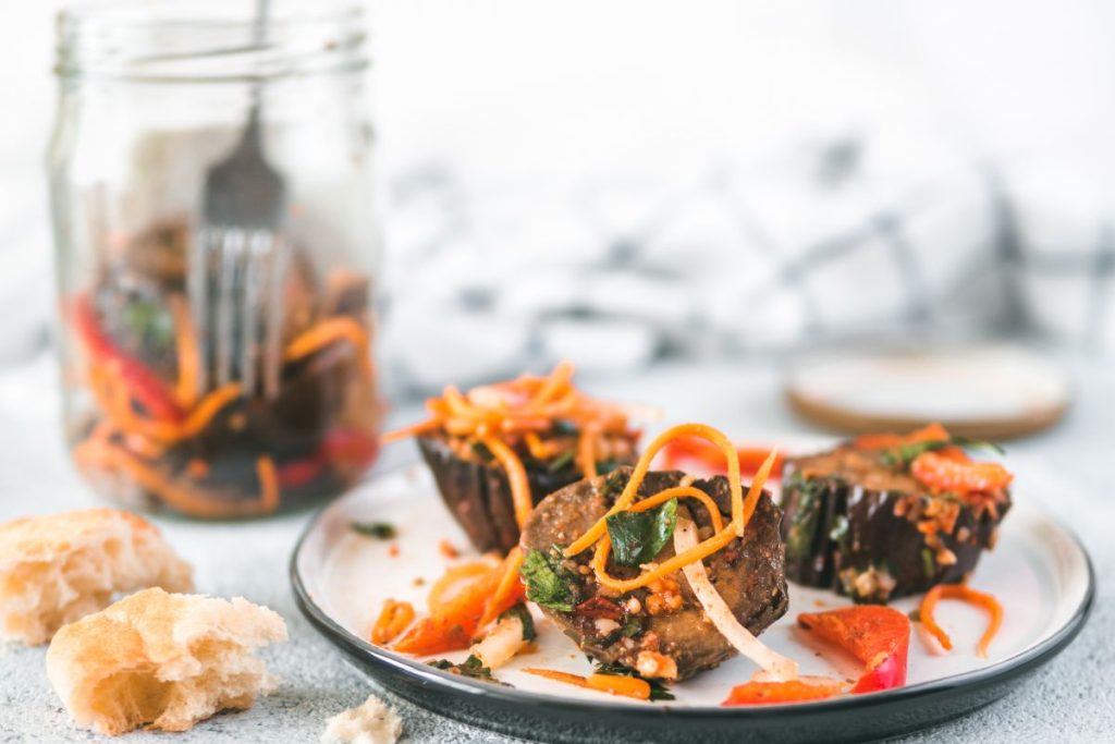 Pickled eggplant salad with carrots and peppers