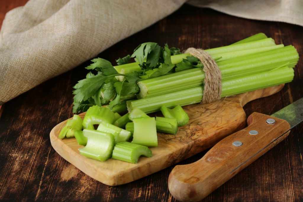 Cutting celery into 2-inch pieces for canning