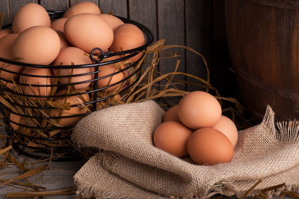 Brown chicken eggs in a basket