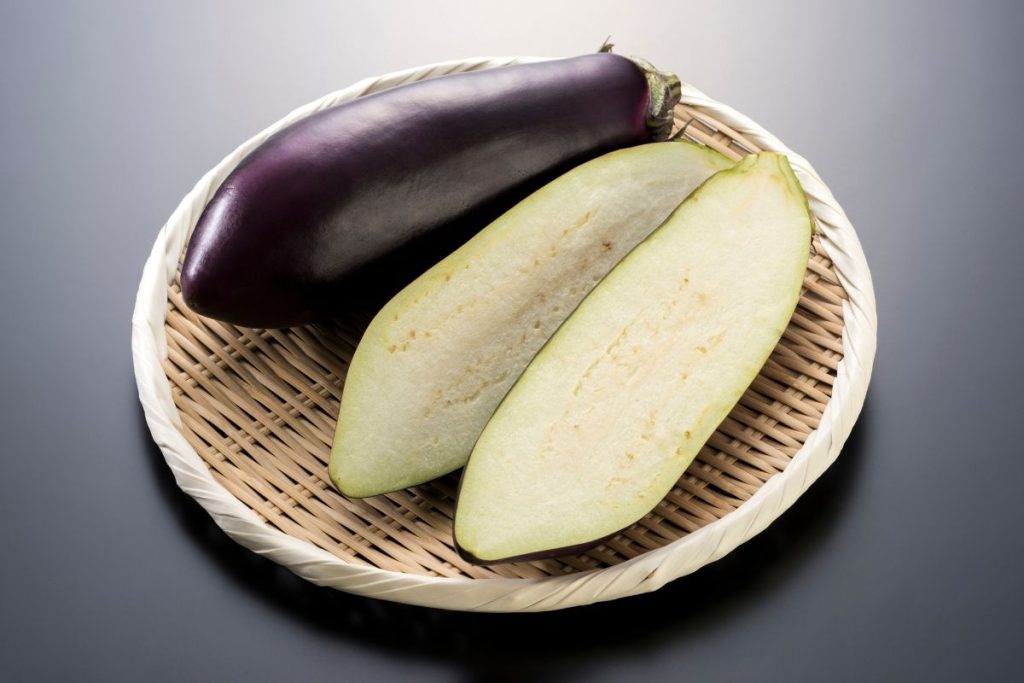 Fresh eggplant sliced in half