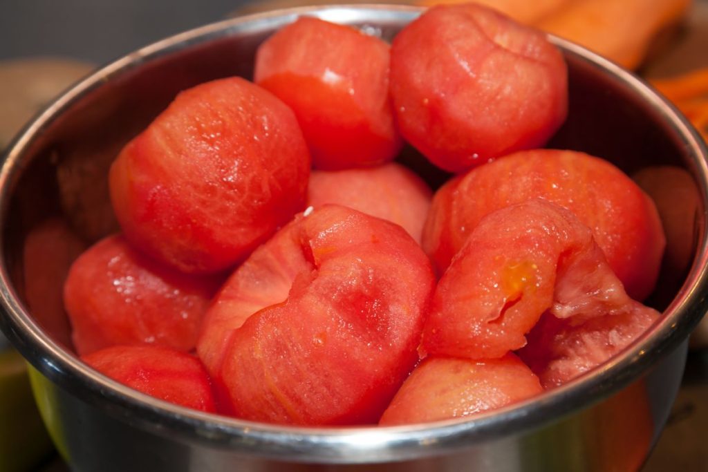 Bowl of peeled tomatoes