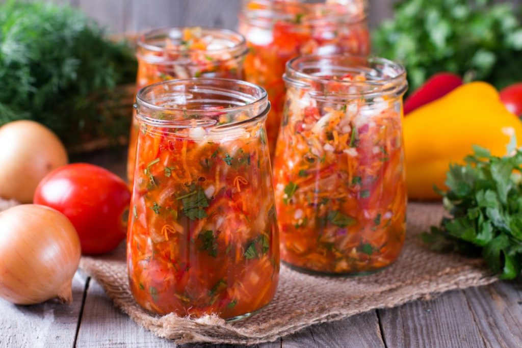 Salsa with carrots in canning jars