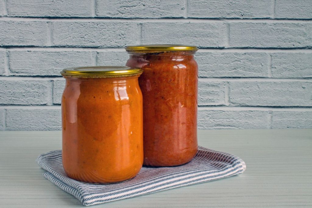 Jars of red enchilada sauce