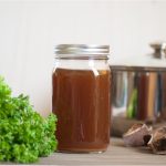 dark bone broth in canning jar