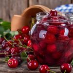 Jar of canned cherries