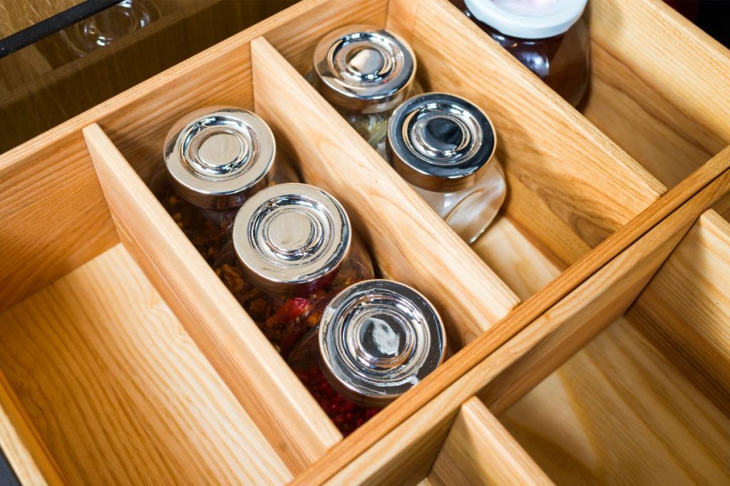 Slide out food drawer with wooden dividers