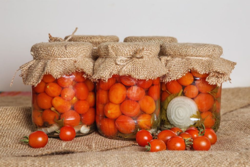 Jars of cherry tomatoes with skins removed