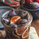 figs in honey syrup in canning jar