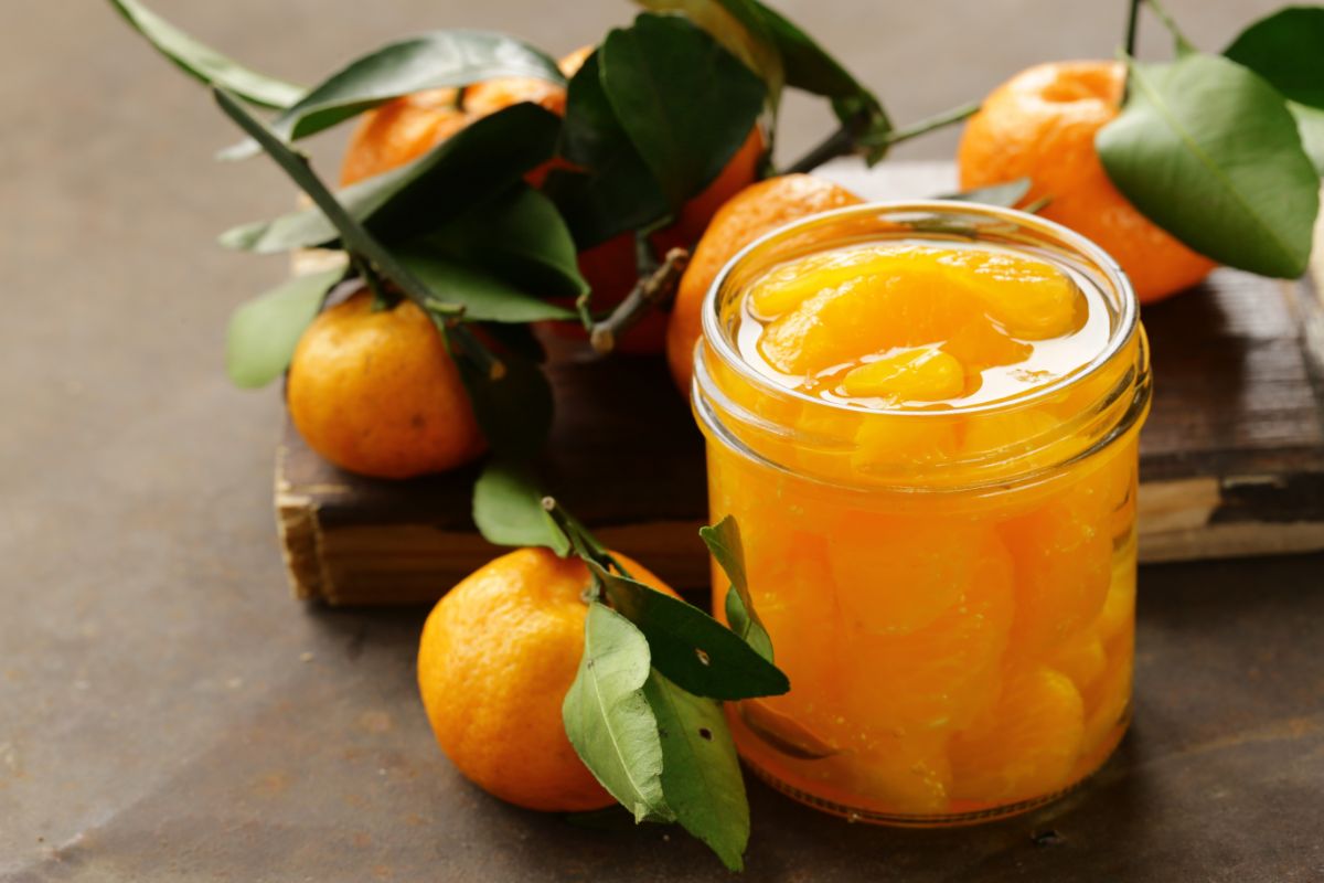 Canned mandarin oranges in open jar
