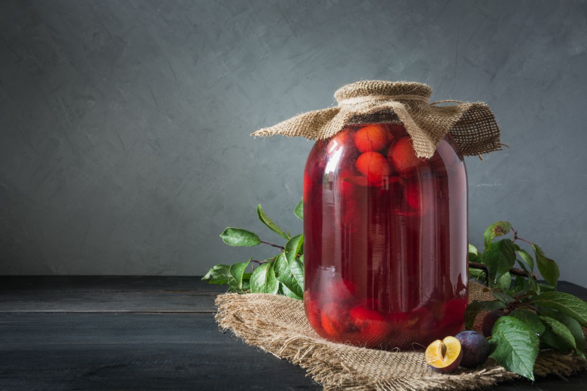 Quart jar of canned plums