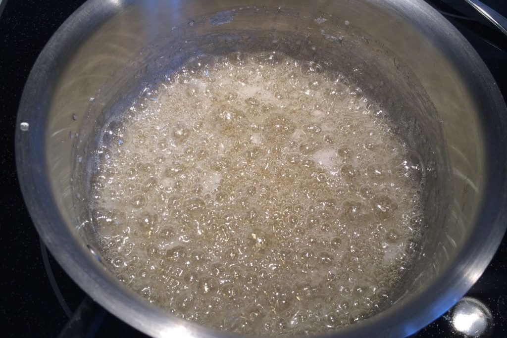 Pot of boiling sugar syrup